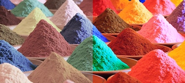 ערמות חול צבעוני וססגוני שמציגות את טווח הצבעים Triluminos PRO