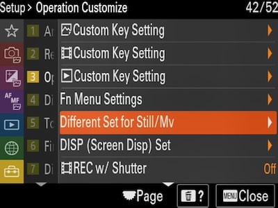 הגדר את התפריט "Operation Customize" (התאמה אישית של הפעלה) כשהסמן על "Different Set for Still/MV"