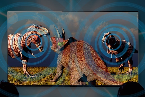 שלושה דינוזאורים בטלוויזיה, עם גלי קול שבוקעים מהמסך כששניים מהדינוזאורים שואגים