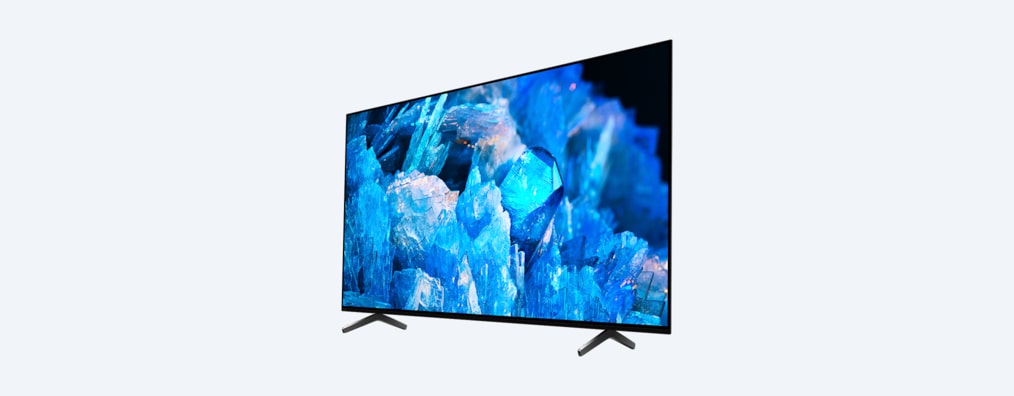 A75K BRAVIA TV צילום בזווית עם מעמד וצילום מסך של קריסטלים כחולים