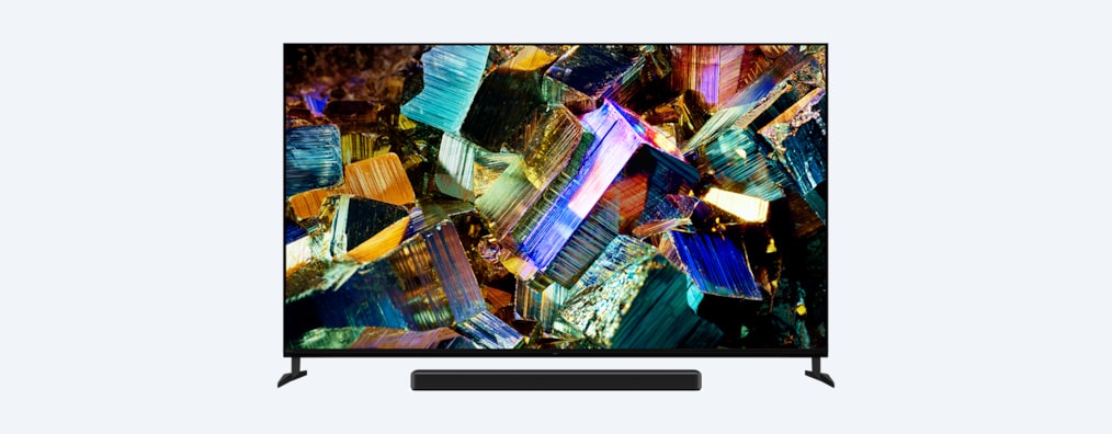צילום מלפנים של טלוויזיית BRAVIA Z9K עם מקרן קול ותמונה של קופסאות נוצצות וצבעוניות על המסך
