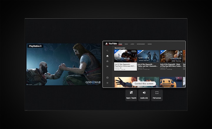 צילום מסך המציג Multi-View, עם God of War Ragnarok בצד שמאל ו-YouTube בצד ימין